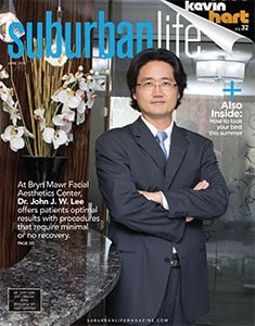 Magazine cover featuring Dr. John Lee