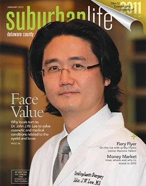 Magazine cover featuring Dr. John Lee