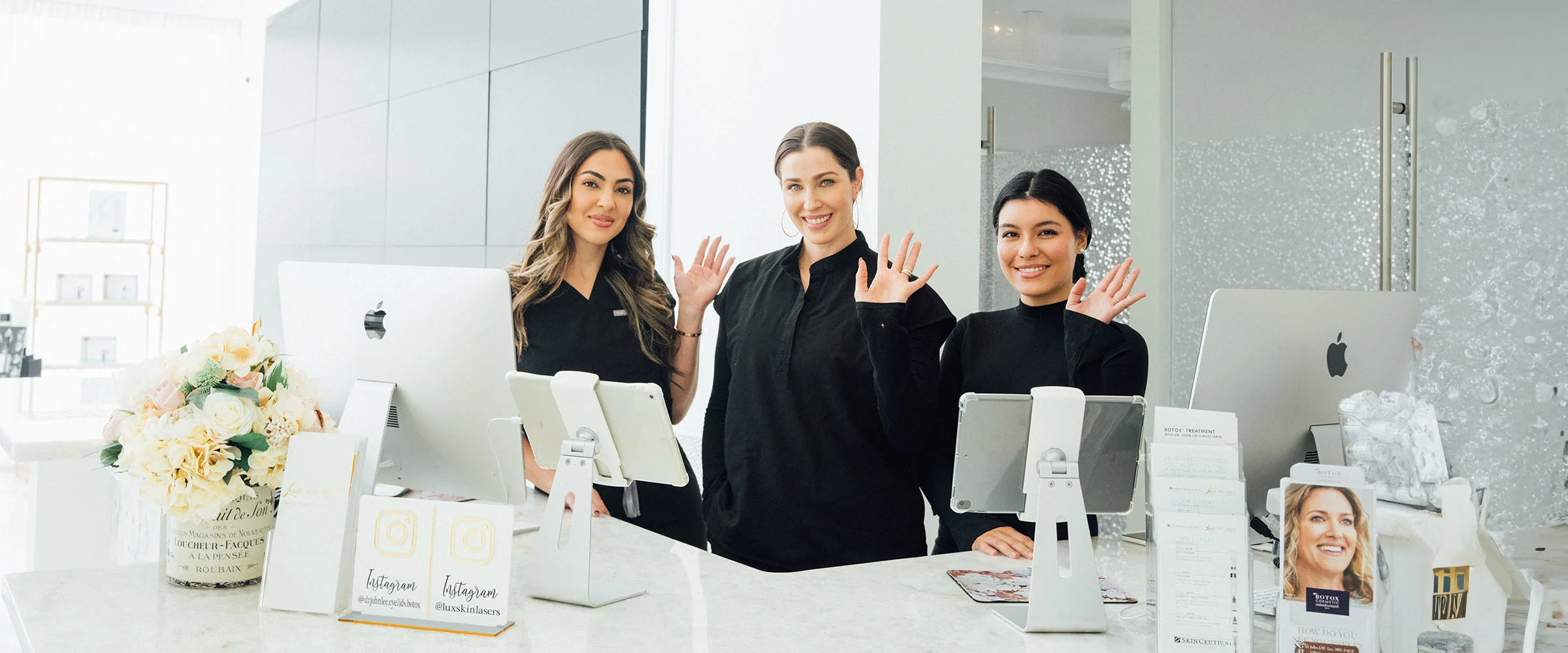 The Lux Skin & Lasers team at the Bryn Mawr front desk
